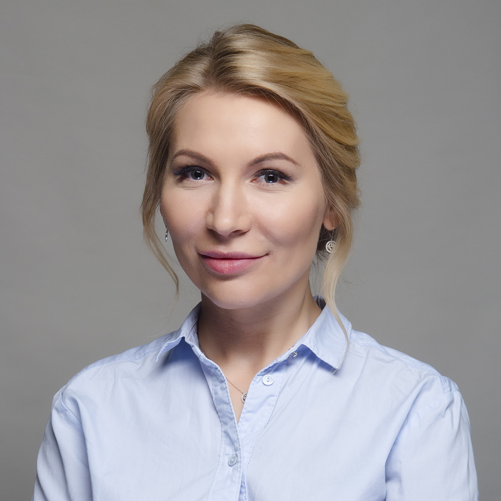 a young blond woman. Russian politician and lawyer Alena Popova