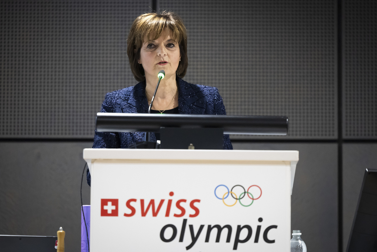 woman with swiss olympic logo