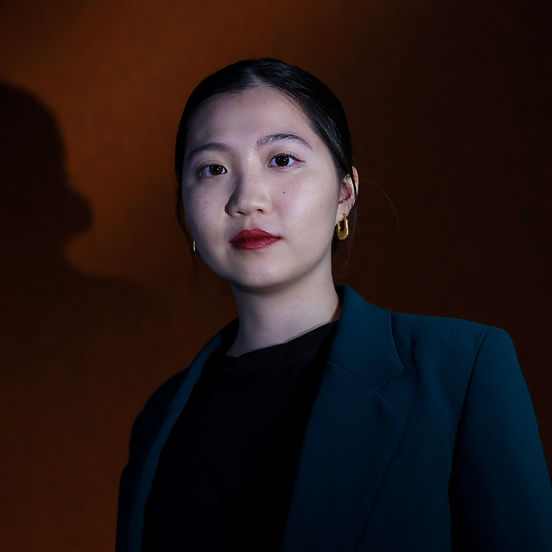 a young east asian woman, Anna Kwok, executive director of the Hong Kong Democracy Council.