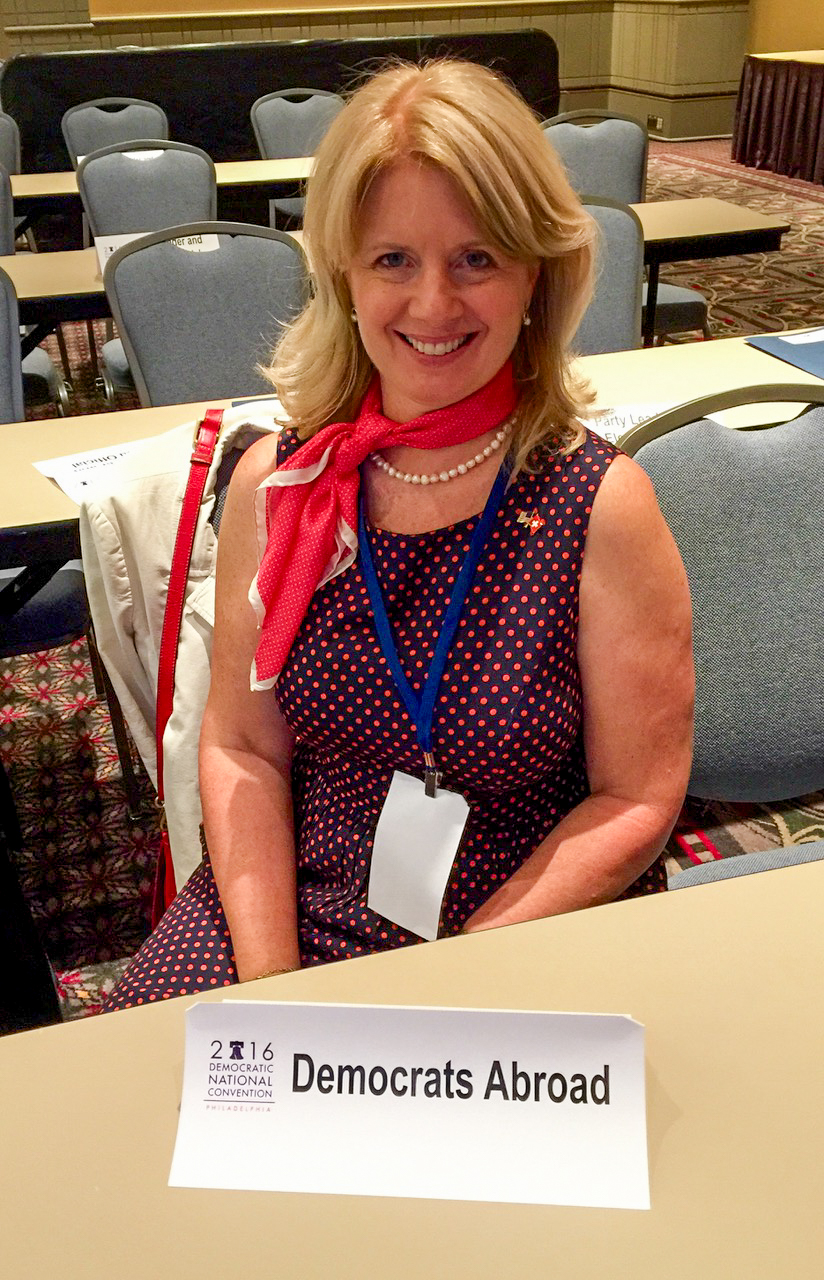 a blond woman in her 30s smiling, Karen Olson-Robins, an American Democratic activist