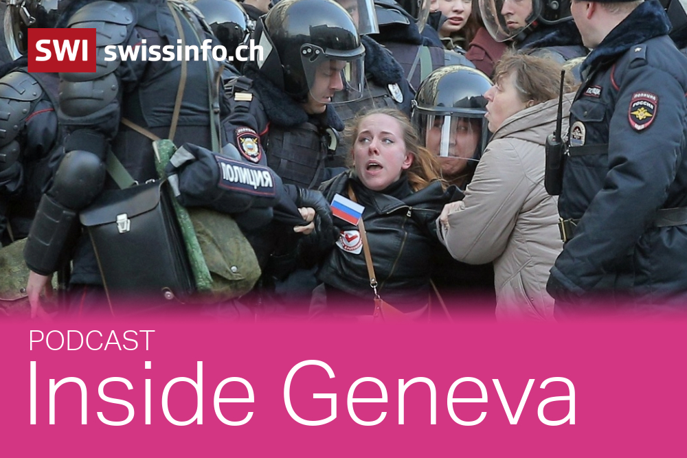 Picture of a woman surrounded by Russian policemen