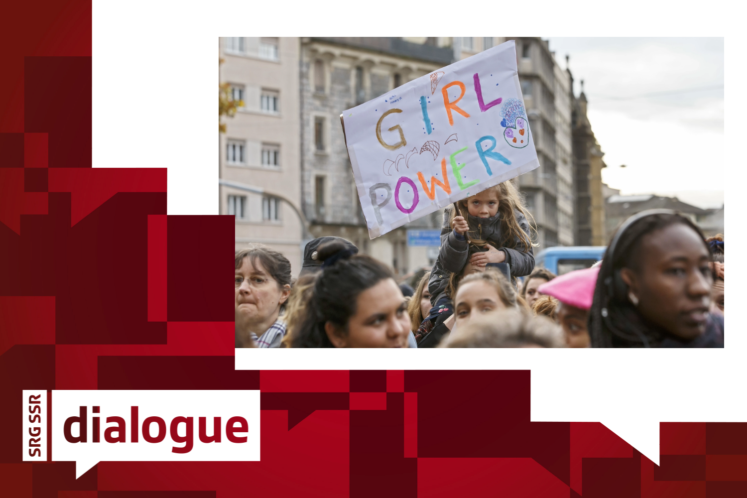 a girl holds up a sign with "girl power" written on it,