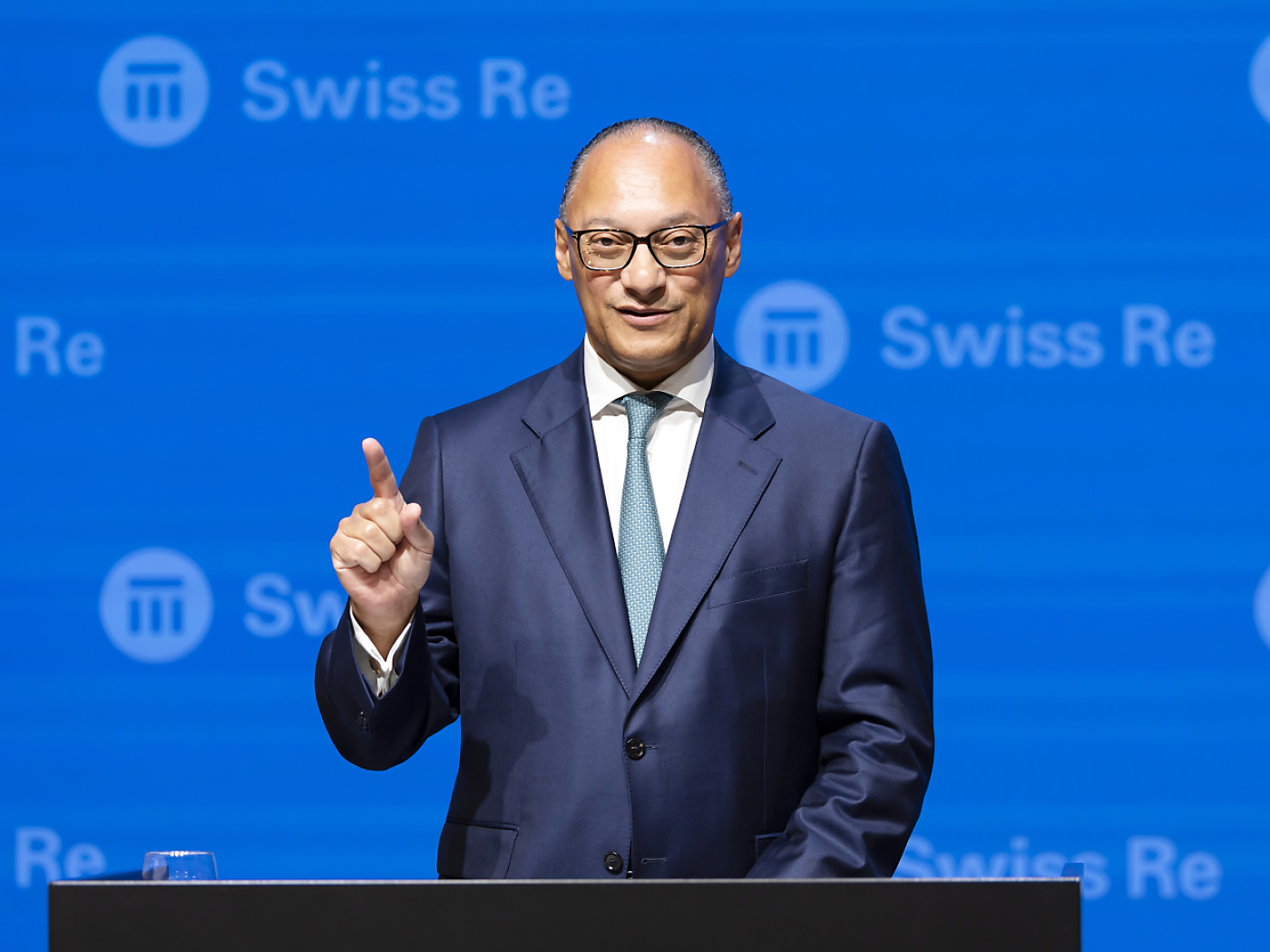 Swiss Re boss sees "trust deficit" after killing in the USA