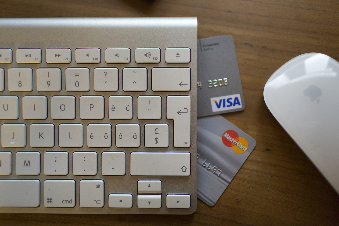 Online shopping with Visa or Mastercard, pictured in Zurich, Switzerland.