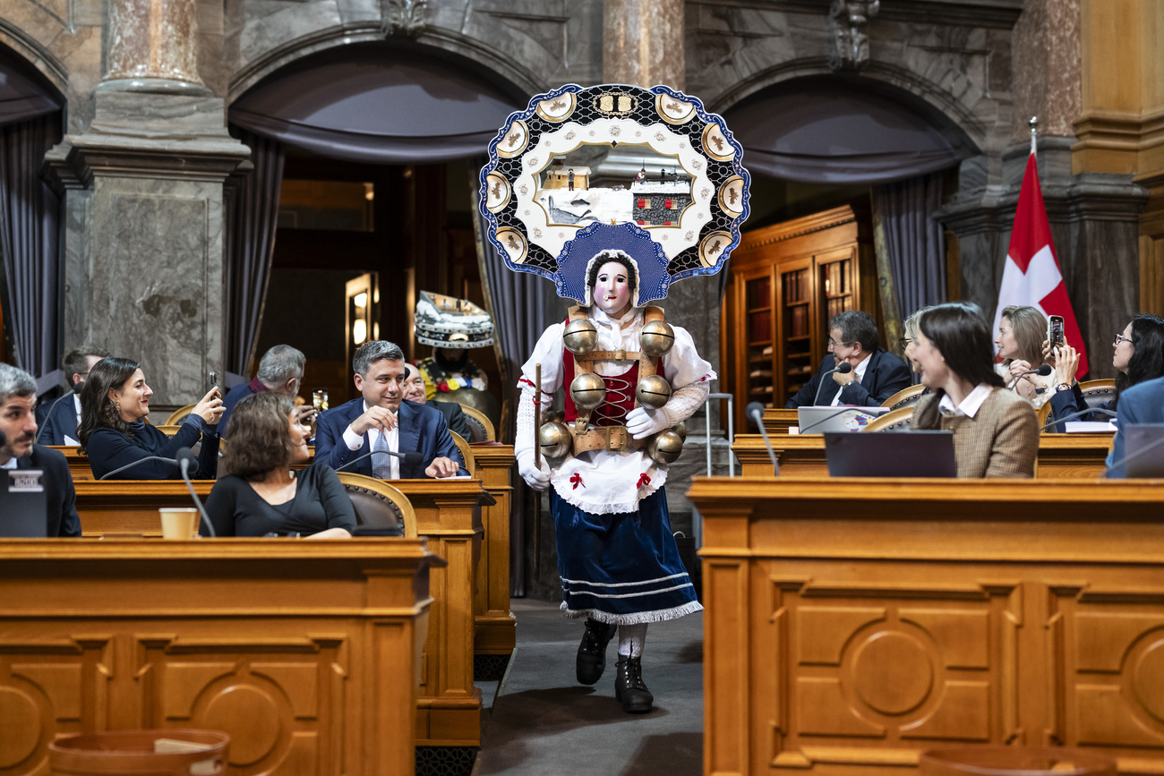 A New Year’s Eve Claus from Appenzell walks through the Senate