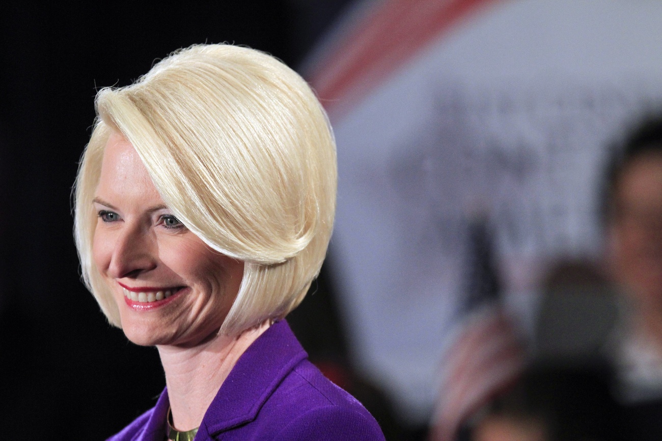 Republican presidential candidate Newt Gingrich's wife Callista Gingrich listens to her husband at a campaign rally at the Marriott Denver West Hotel in Golden, Colorado, USA, 06 February 2012. Gingrich is scheduled to speak at the Colorado Energy Summit at the Colorado School of Mines later in the day.