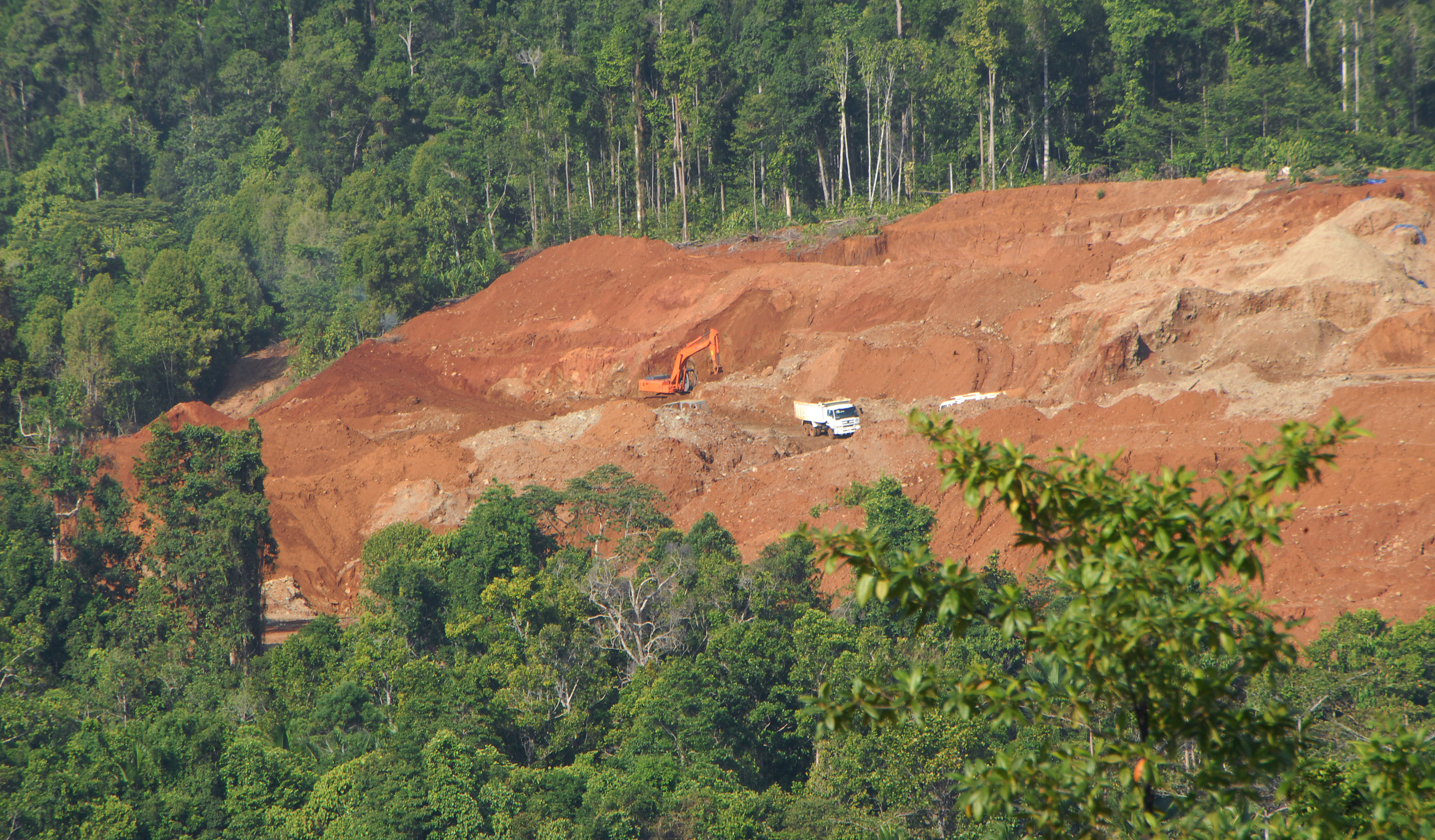 A truck picks up earth containing nickel ore from a mine cut out of forests on Halmahera island in eastern Indonesia.