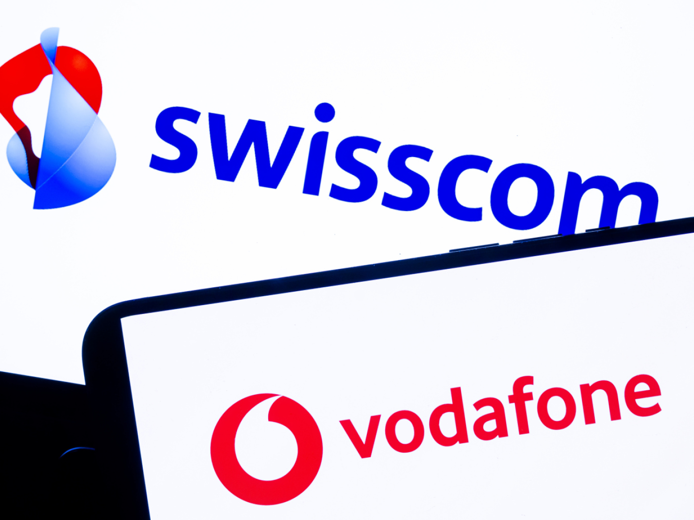 loghi swisscom e vodafone