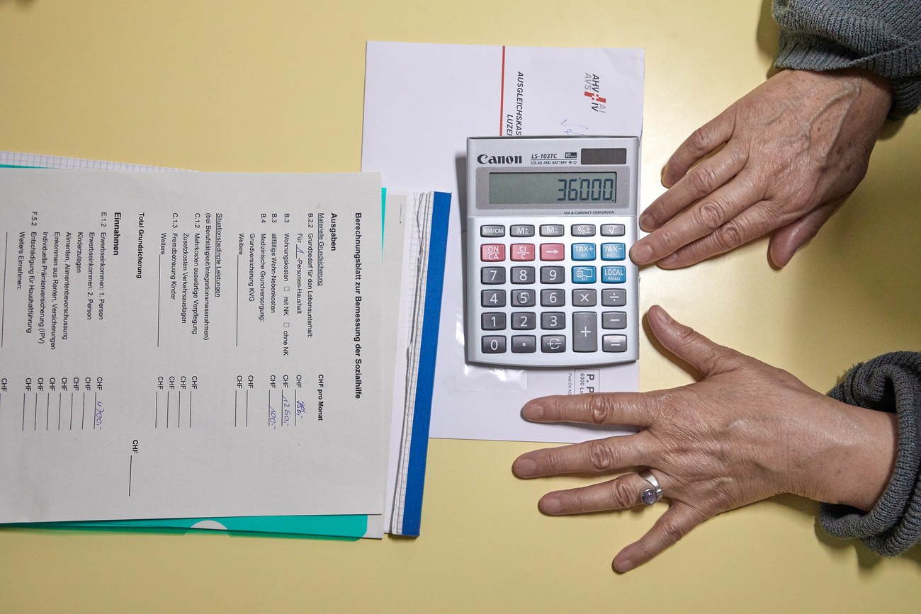 [Symbolic Image, Staged Picture] A Caritas debt advisor, left, and a female client, right, during a debt councelling meeting a Caritas councelling office in Lucerne, Switzerland,