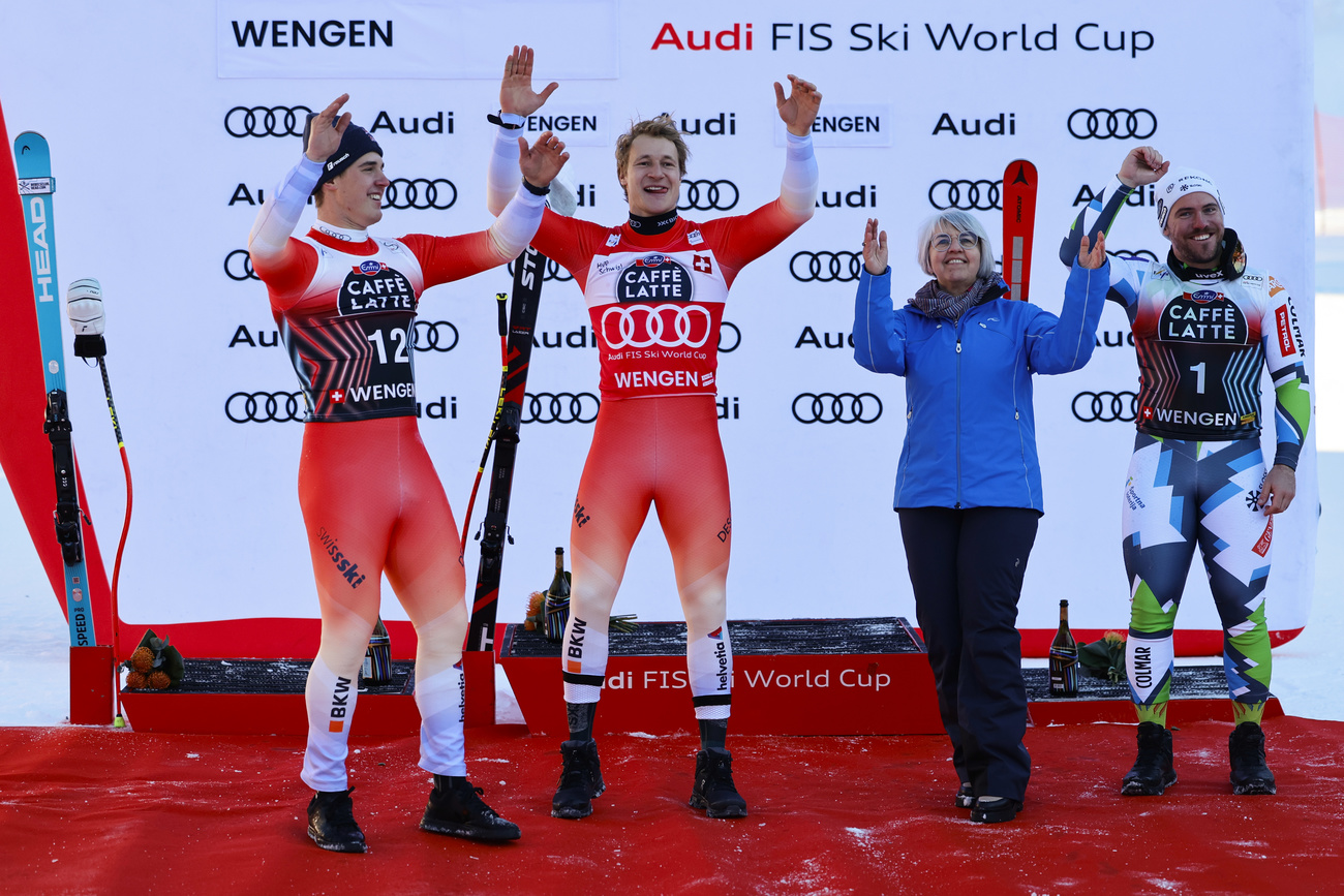 Marco Odermatt with second and third place finishers at Lauberhorn, 2025