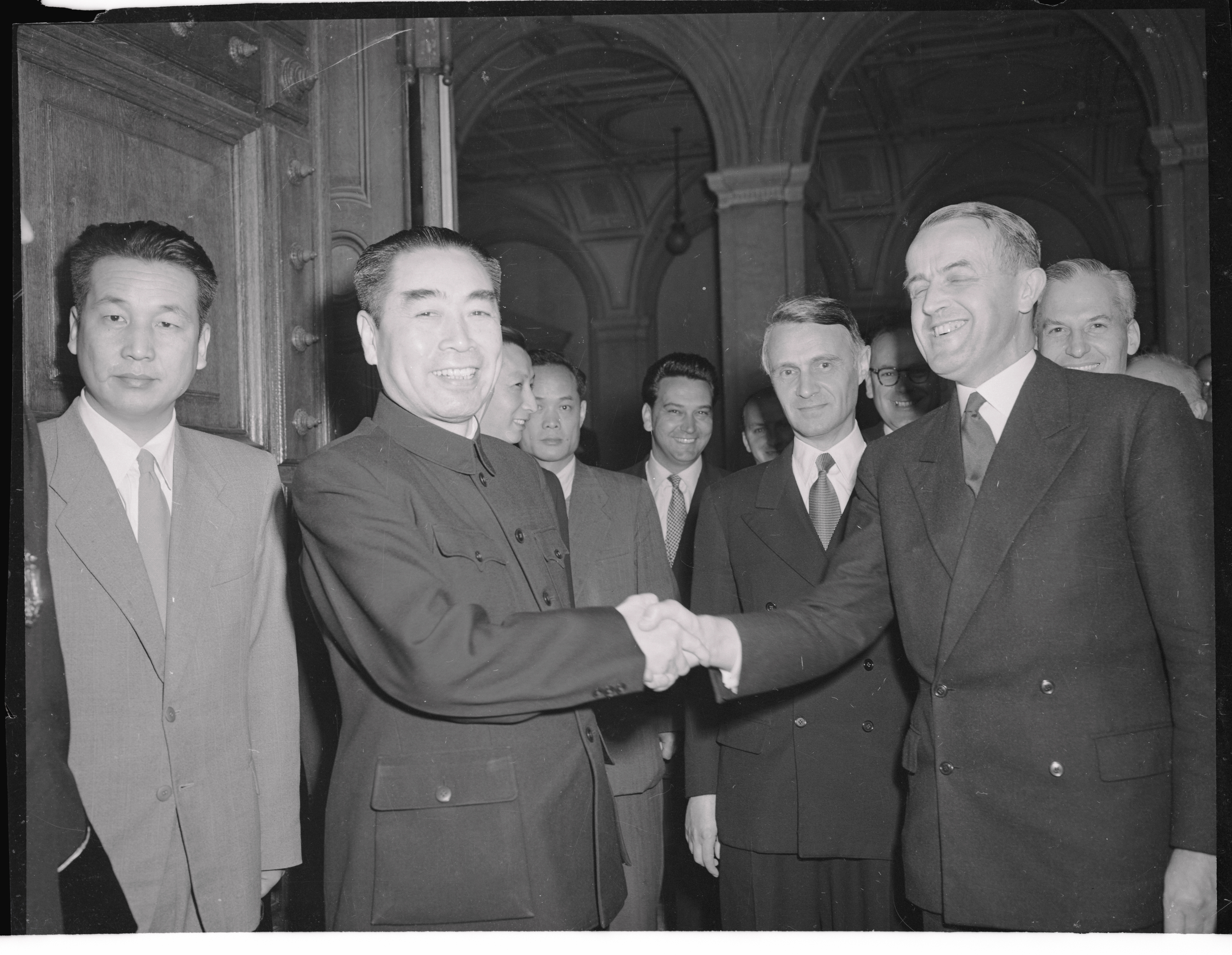 Chou En Lai, Chinese Foreign Affairs Minister, shakes hands with Mr. Petitpierre, Switzerland