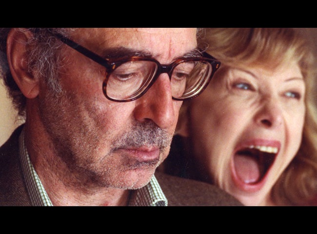 She doesn't have to yell to make her point: Anne-Marie Miéville with Jean-Luc Godard in a scene of her film "Nous sommes tous encore ici" (We are all still here), 1996.