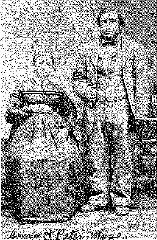 Un couple du 19e siècle prenant la pose pour le photographe