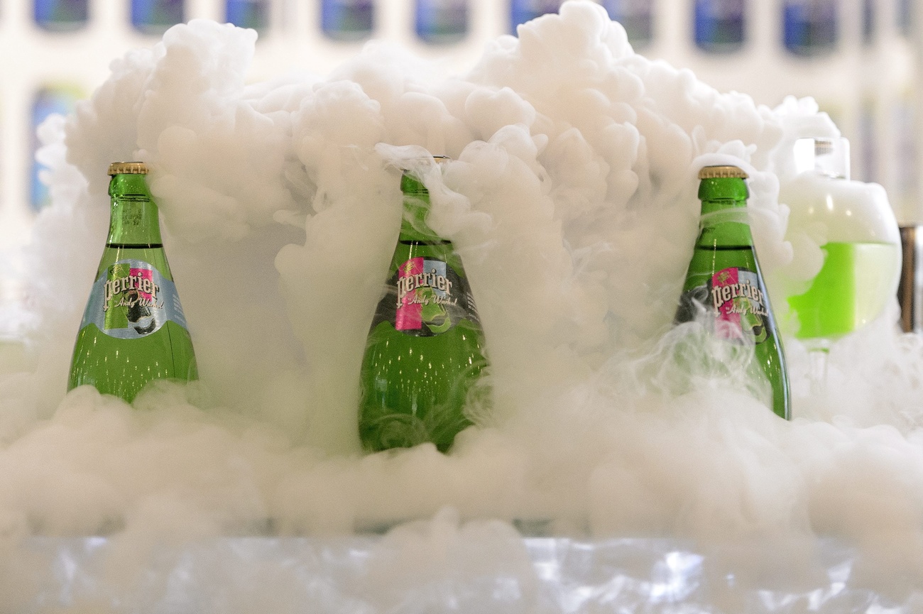 Bottles of Perrier sparkling water are presented in front of liquid nitrogen before the general meeting of the world's biggest food and beverage company, Nestle Group, in Lausanne, Switzerland, Thursday, April 11, 2013. (KEYSTONE/Laurent Gillieron)