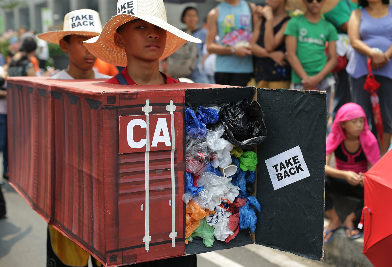 A protest in Manila, Philippines, asking Canada to take back its illicit garbage.