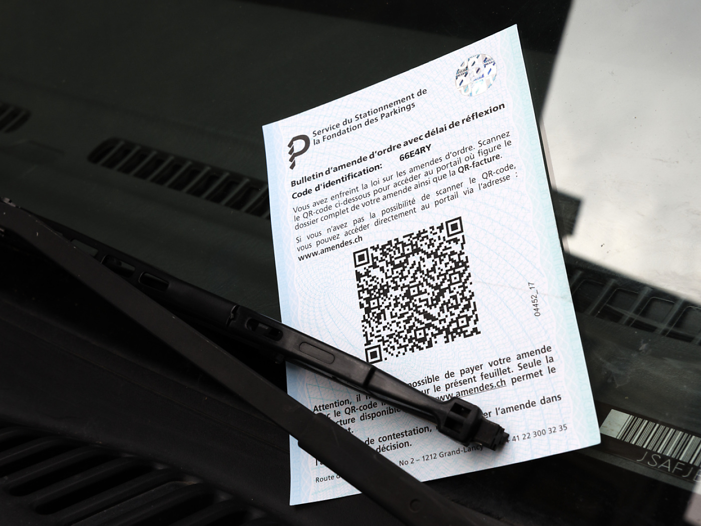 Enforcing parking fines for foreigners