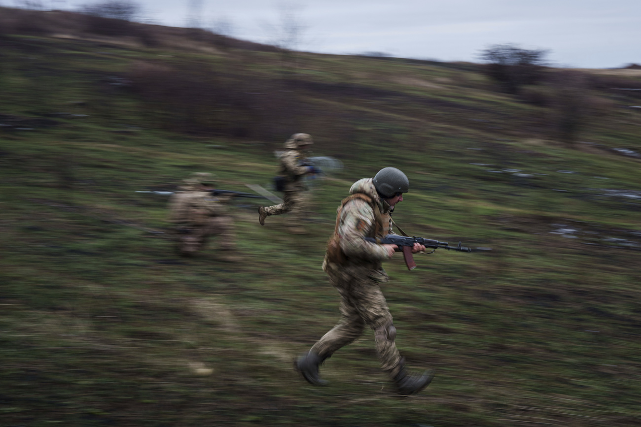 Ukrainian servicemen of 24th Mechanized brigade train at the polygon not far from frontline in Donetsk region, Ukraine, Tuesday, Jan. 21,