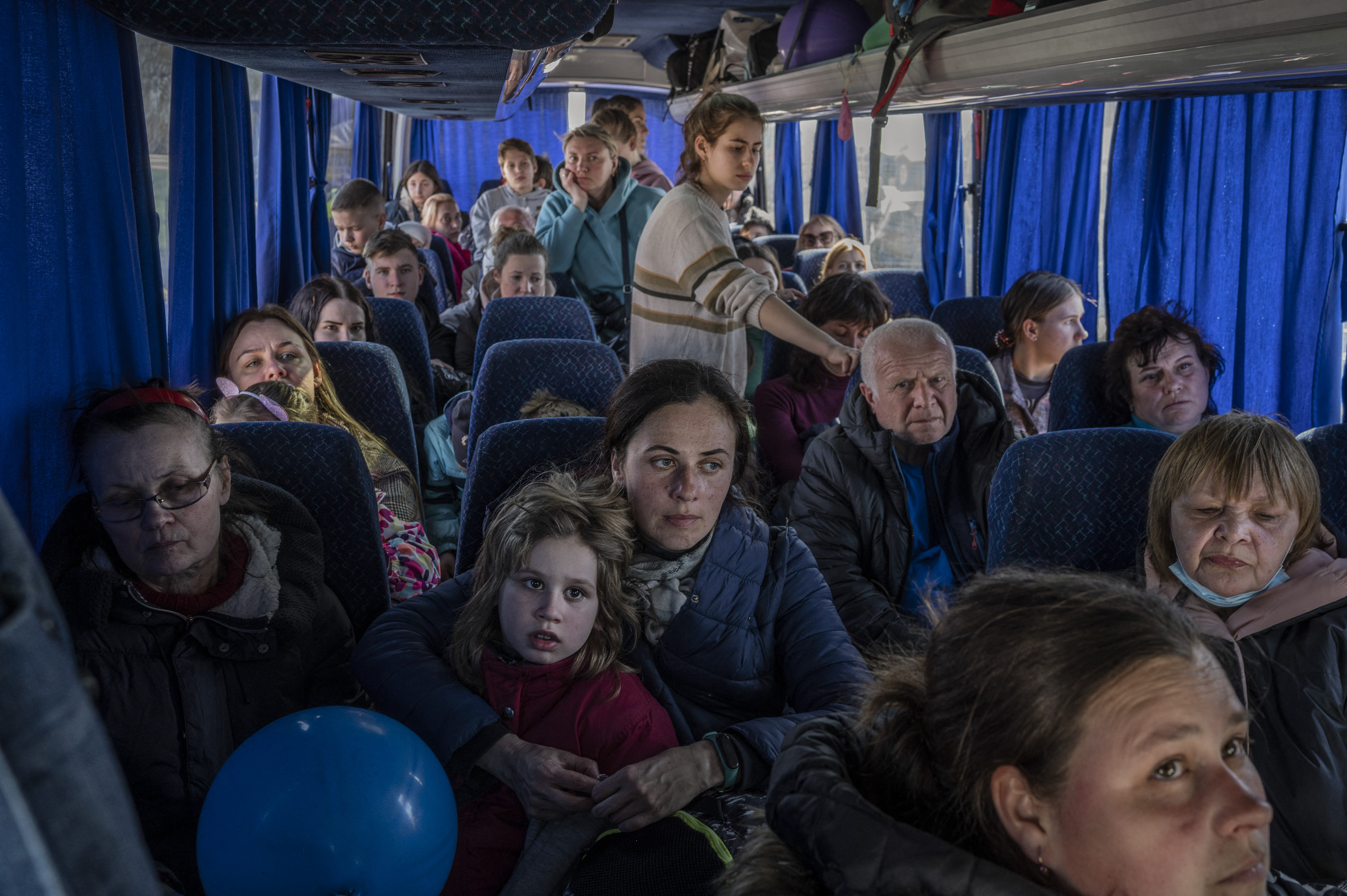 People on a crowded bus