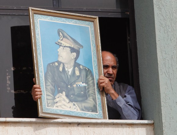 Case over Gaddafi poster in Geneva abandoned - SWI swissinfo.ch