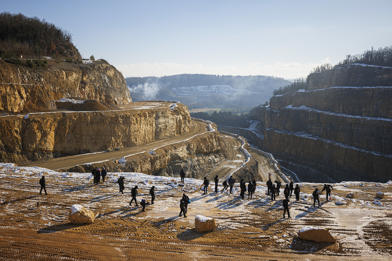 Protesters hold 'funeral' for site of Holcim quarry extension SWI